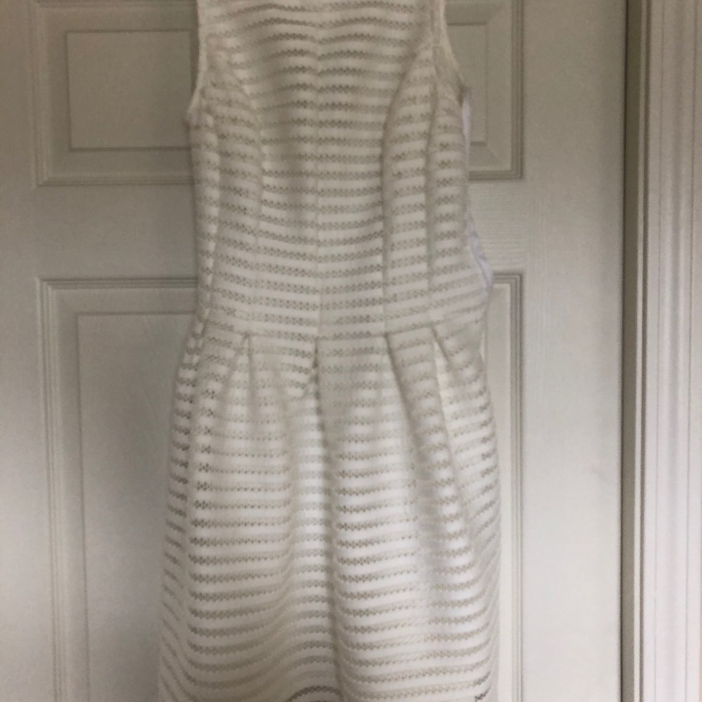 White knee length dress